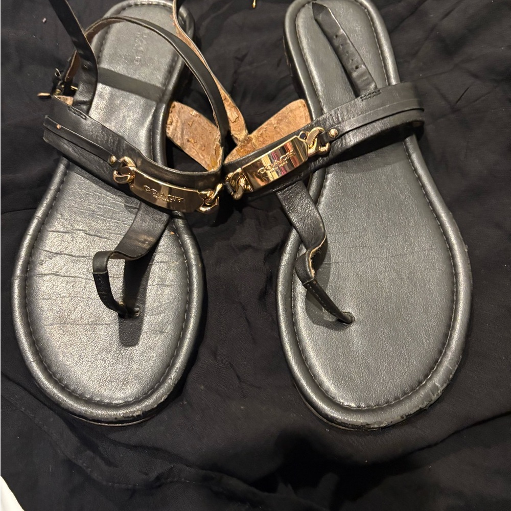 Women’s Coach Black Leather T-Strap Sandals with Gold Accent